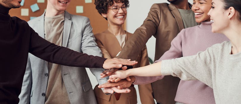 Photo Of People Holding Each Other's hands